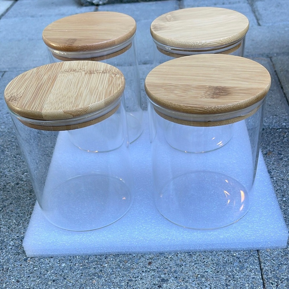 NEW in box, set of 4 borosilicate glass jars with bamboo lids, 5 in tall, 27 oz